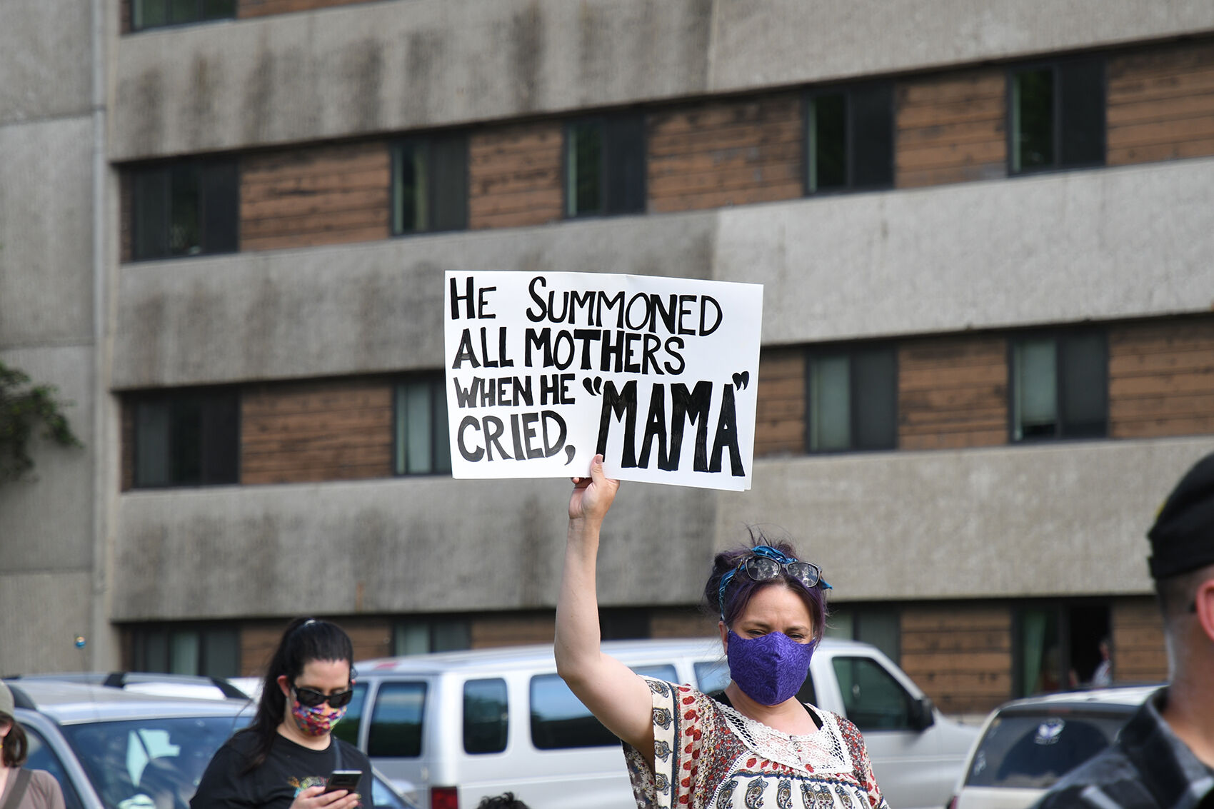 Mothers sign at Spencer march